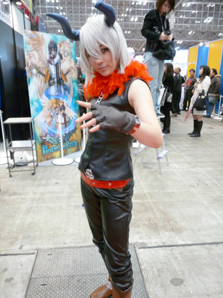 Illustration for article titled 2009's Cosplaying Arcade Game Booth Companions